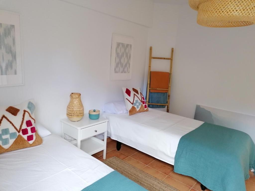 Posteľ alebo postele v izbe v ubytovaní Beach Front Las Burras