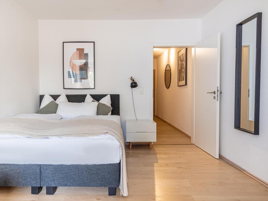 Postel nebo postele na pokoji v ubytování limehome Magdeburg Breiter Weg