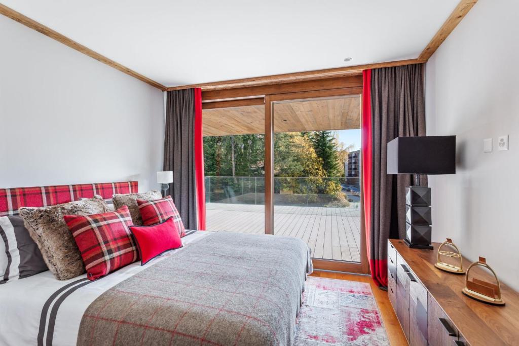 Postel nebo postele na pokoji v ubytování Sport Club Residences & Spa