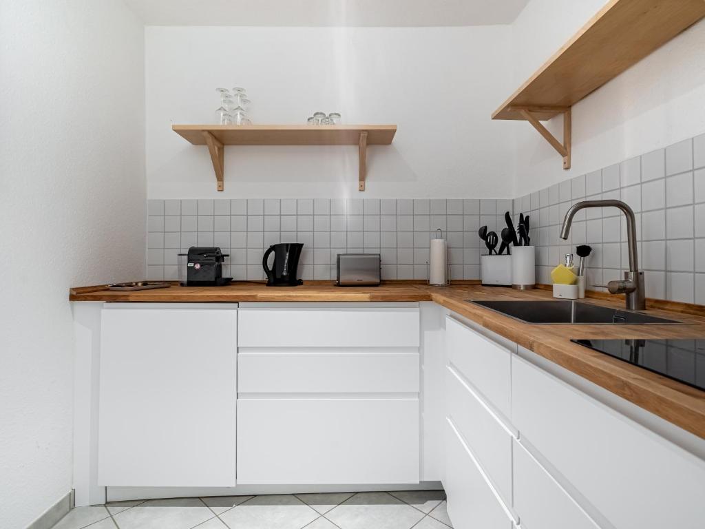 Kuchyň nebo kuchyňský kout v ubytování limehome Magdeburg Breiter Weg