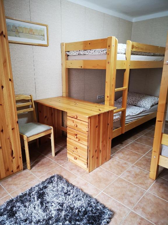 Voodi või voodid majutusasutuse Dráchovský apartmán a vejminek toas