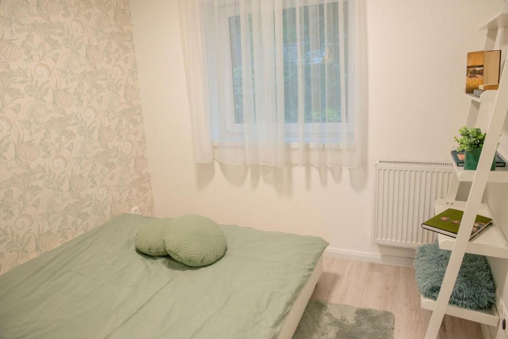 Postel nebo postele na pokoji v ubytování Panoramic apartments