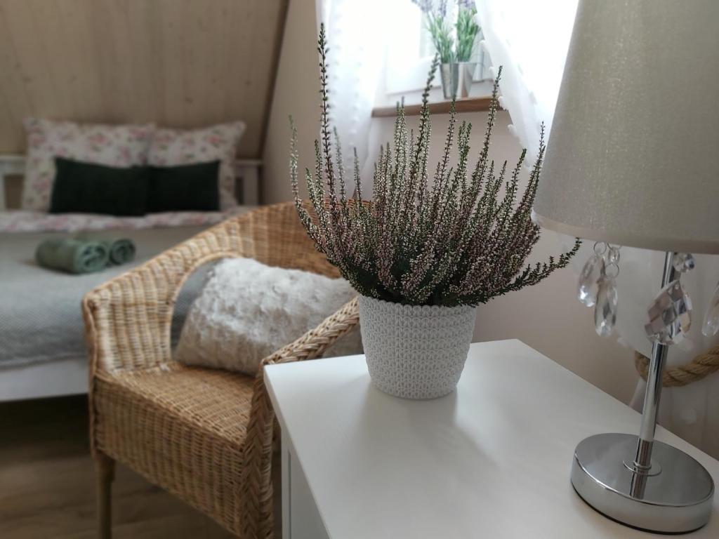 Postel nebo postele na pokoji v ubytování Osada wspomnień