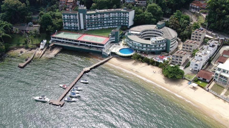 an aerial view of a beach with boats in the water at Angra Inn - Praia Grande 206 in Angra dos Reis