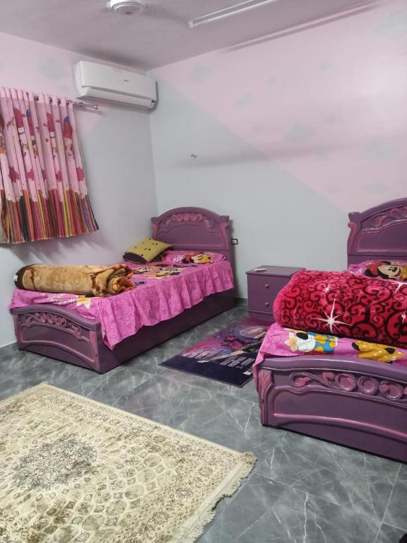 Postel nebo postele na pokoji v ubytování El Prince Guesthouse