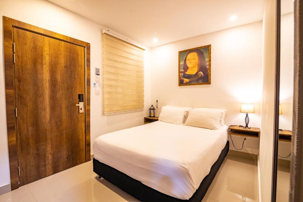 Postel nebo postele na pokoji v ubytování Hotel Amoek