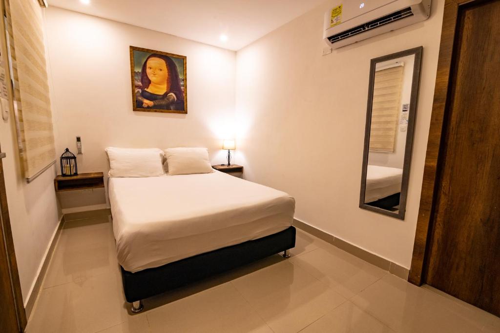 Postel nebo postele na pokoji v ubytování Hotel Amoek