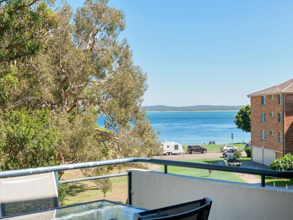 a view of the ocean from the balcony of a house at Mistral Court Unit 16 17 Mistral Close in Nelson Bay