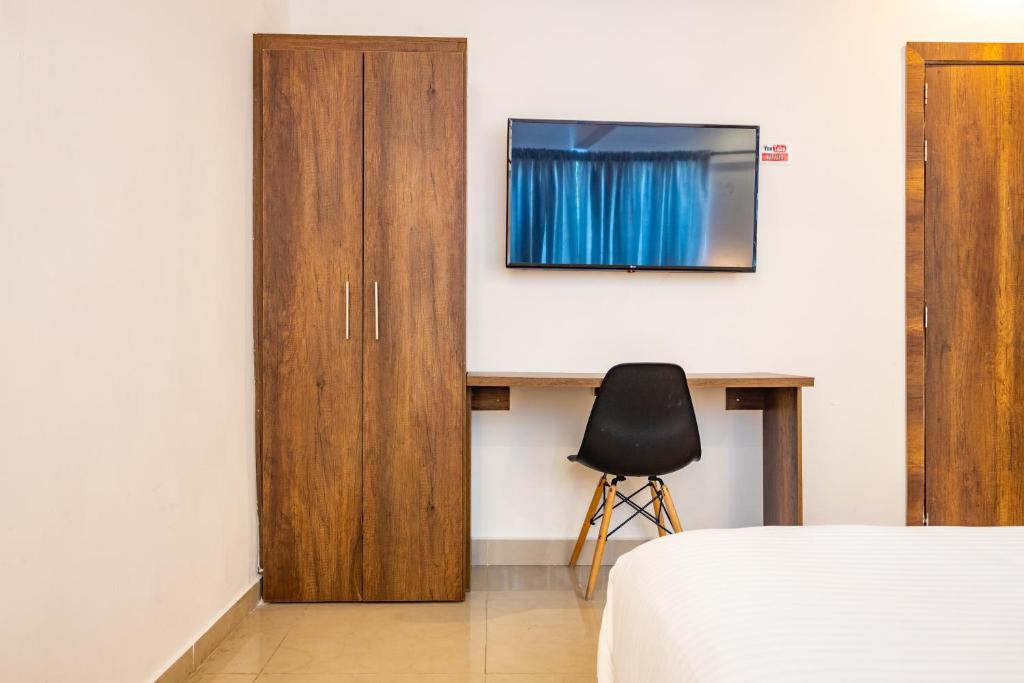 Postel nebo postele na pokoji v ubytování Hotel Amoek
