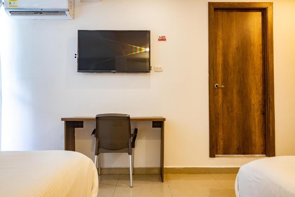 TV a/nebo společenská místnost v ubytování Hotel Amoek