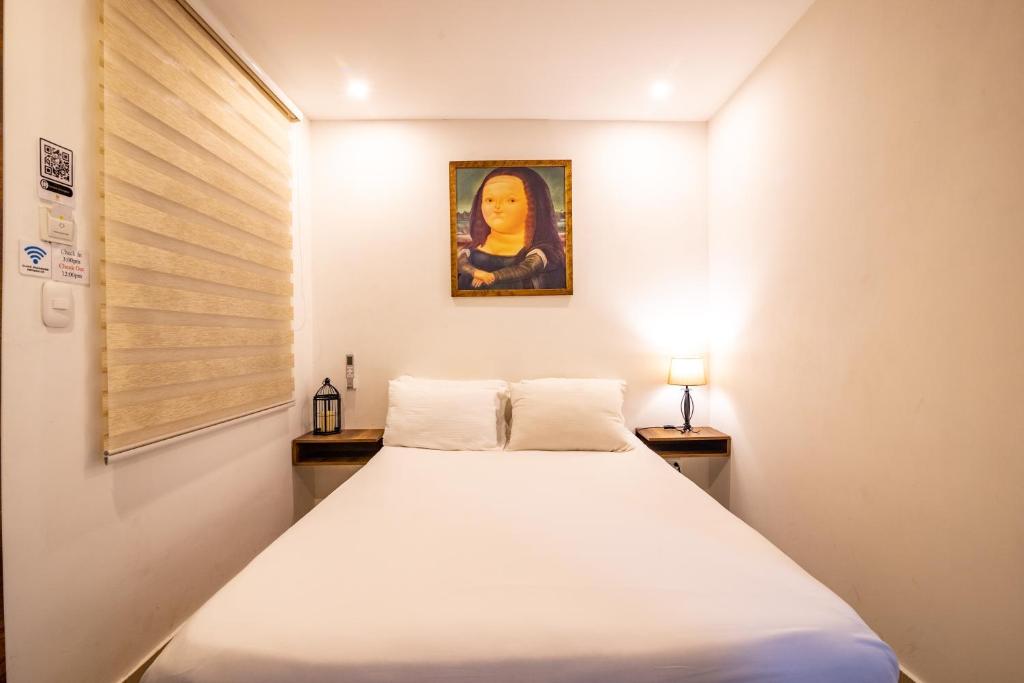Postel nebo postele na pokoji v ubytování Hotel Amoek