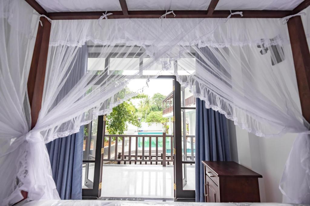 Balkón nebo terasa v ubytování Hotel Calm Haven Unawatuna