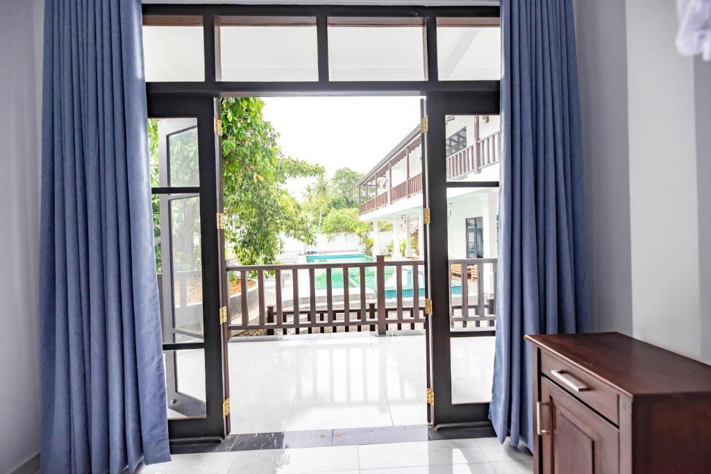Balkón nebo terasa v ubytování Hotel Calm Haven Unawatuna