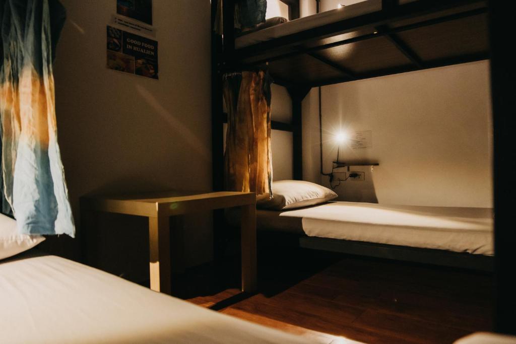 Postel nebo postele na pokoji v ubytování Lazy House