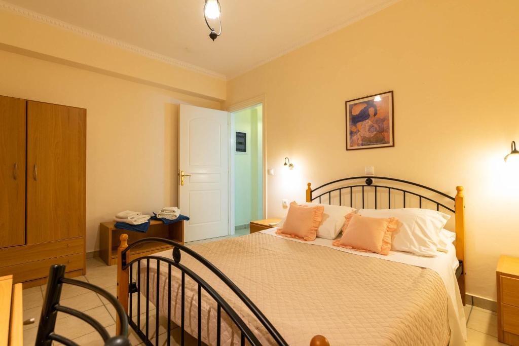 Posteľ alebo postele v izbe v ubytovaní Lenna's Villas Zante