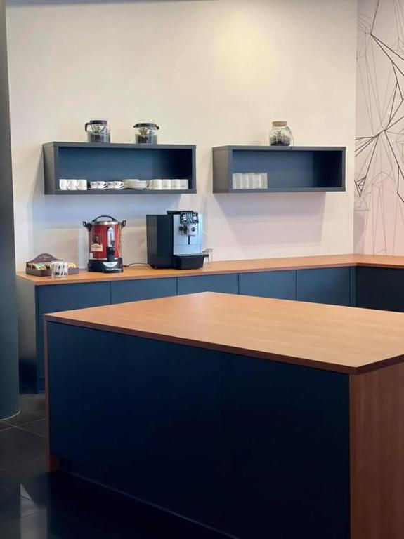 Kuchyň nebo kuchyňský kout v ubytování Hotel Hi-Fi Spa