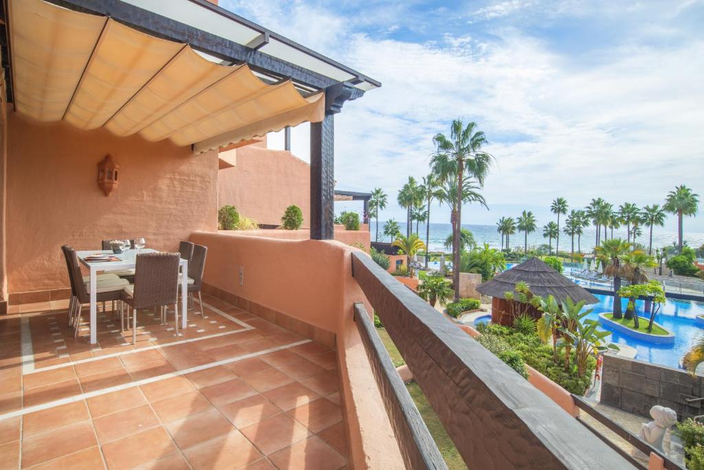 The swimming pool at or close to High standard beach front apartment
