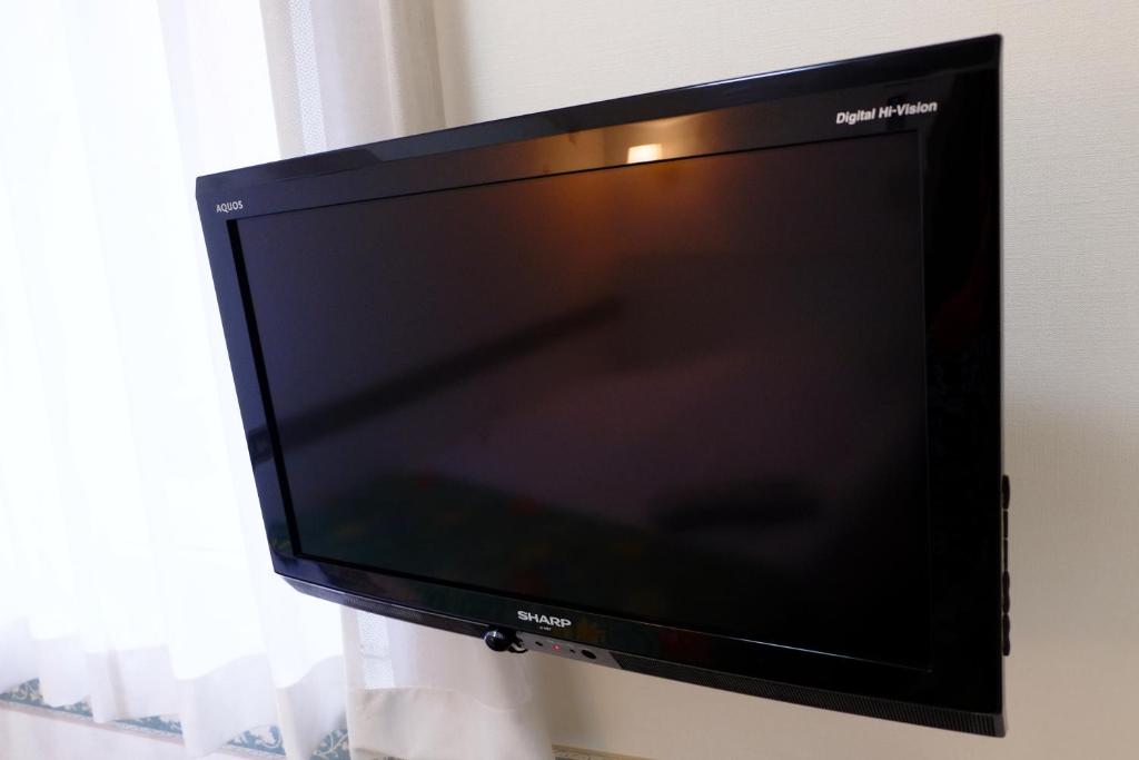 TV a/nebo společenská místnost v ubytování Hotel Check In Shimbashi