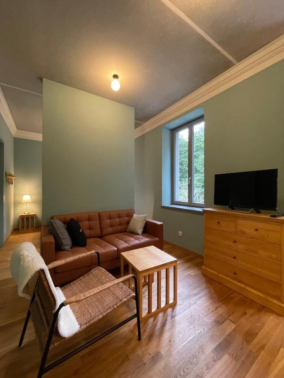 TV a/nebo společenská místnost v ubytování Gästehaus Phantasie