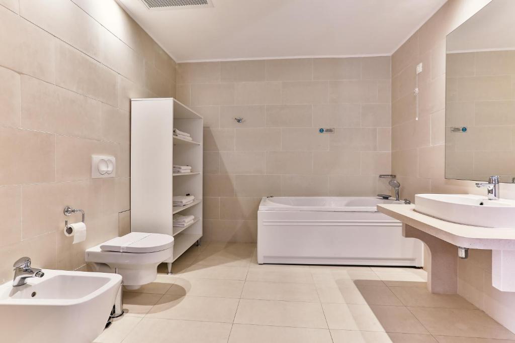 Koupelna v ubytování Carine Hotel Delfin