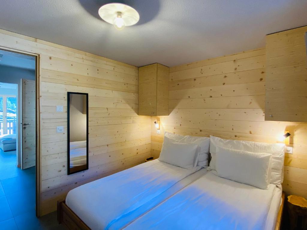 Postel nebo postele na pokoji v ubytování Chalet Bergheimat Zermatt