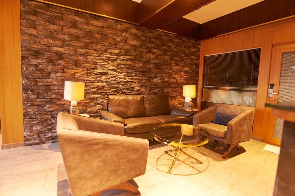 Posezení v ubytování Hotel G-Square - Shirdi