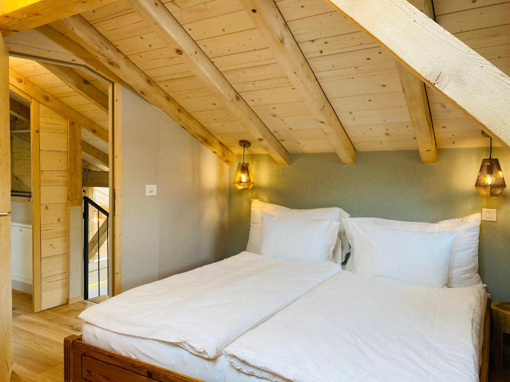 Postel nebo postele na pokoji v ubytování Chalet Bergheimat Zermatt