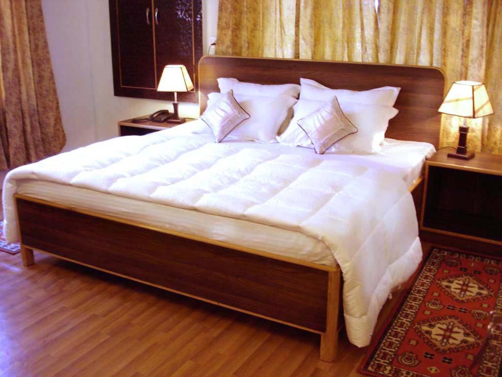 Postel nebo postele na pokoji v ubytování Ikraam Inn Bed & Breakfast