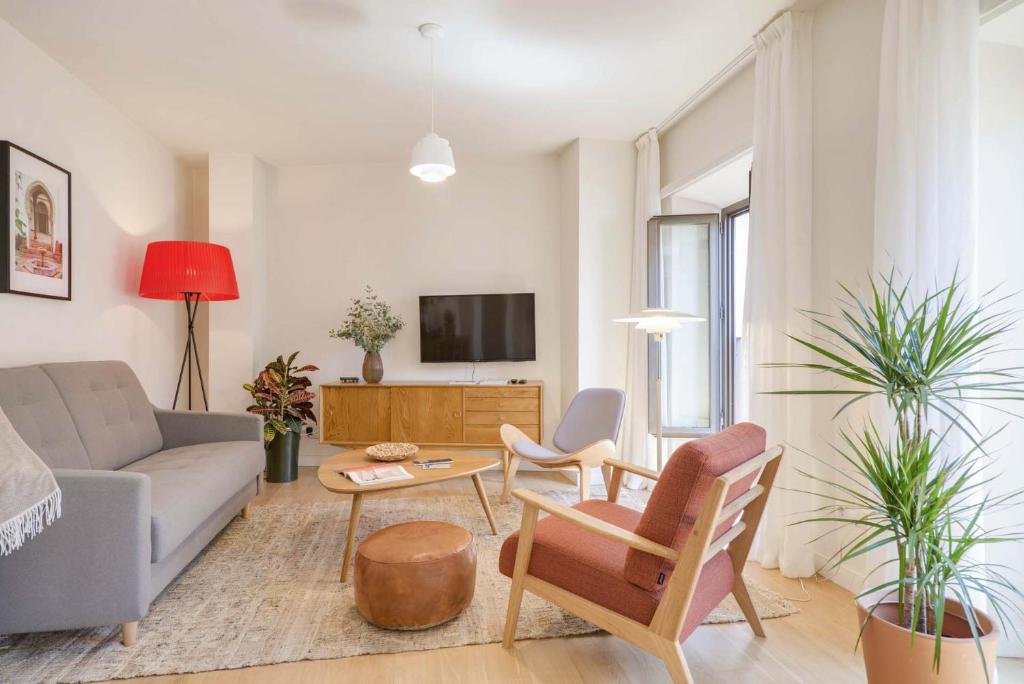 Telewizja i/lub zestaw kina domowego w obiekcie Larios Suites in Malaga by Solaga Holiday Homes