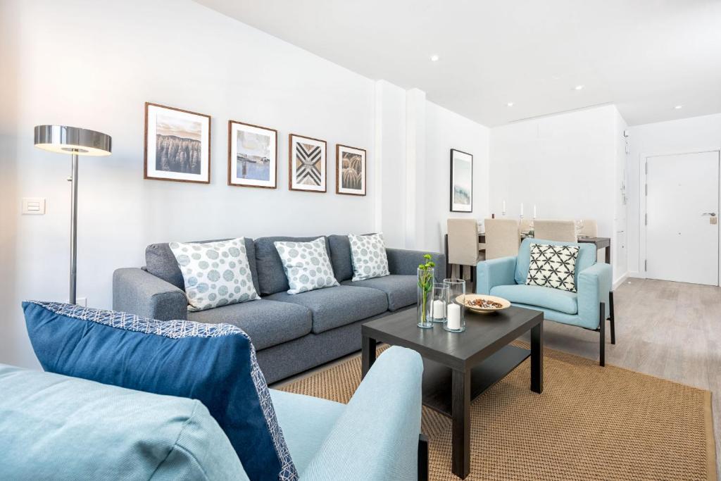 Posedenie v ubytovaní Merced Suites in Malaga by Solaga Holiday Homes