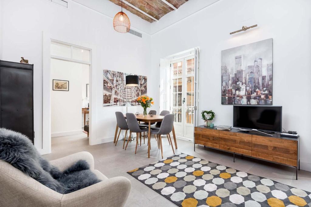 Telewizja i/lub zestaw kina domowego w obiekcie Casapalma Apartment in Malaga by Solaga Holiday Homes