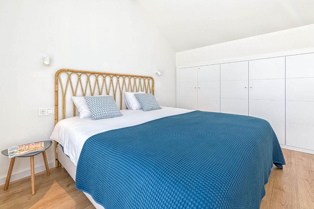 Łóżko lub łóżka w pokoju w obiekcie Teatro Apartment in Malaga by Solaga Holiday Homes