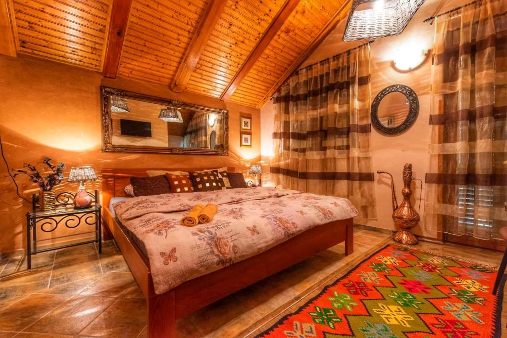 Postel nebo postele na pokoji v ubytování Pansion Bubamara Mostar