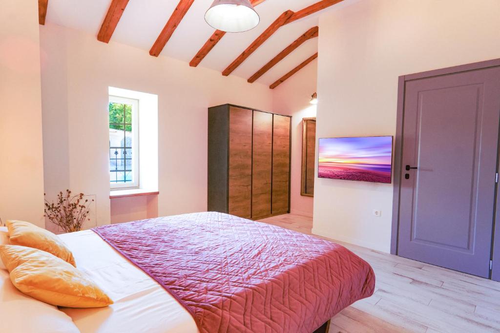 Postel nebo postele na pokoji v ubytování Holiday Home Nika