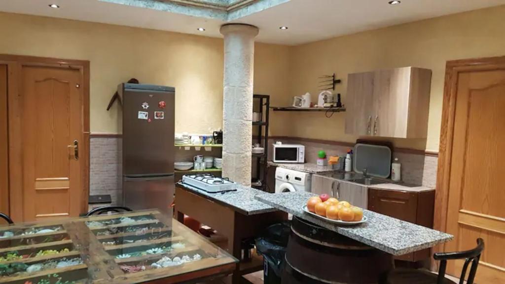 Kuchyň nebo kuchyňský kout v ubytování Habitación en Ocaña