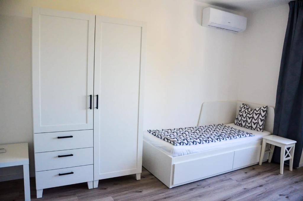 Postel nebo postele na pokoji v ubytování Apartmán u Vítka