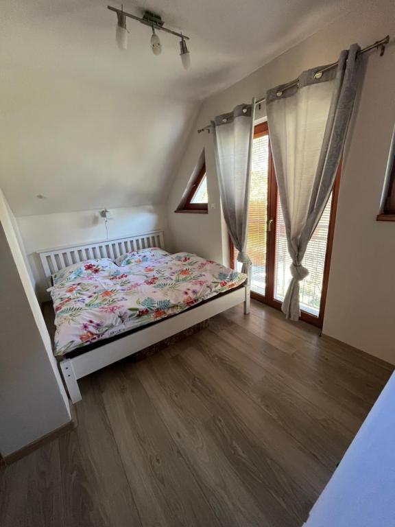 Postel nebo postele na pokoji v ubytování Celý dům FLORA v Českosaském Švýcarsku
