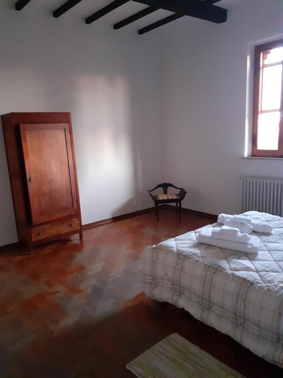 Een bed of bedden in een kamer bij Casa Porciatti