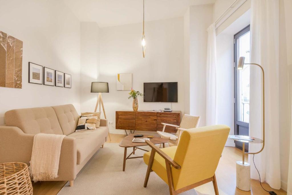 Telewizja i/lub zestaw kina domowego w obiekcie Larios Suites in Malaga by Solaga Holiday Homes
