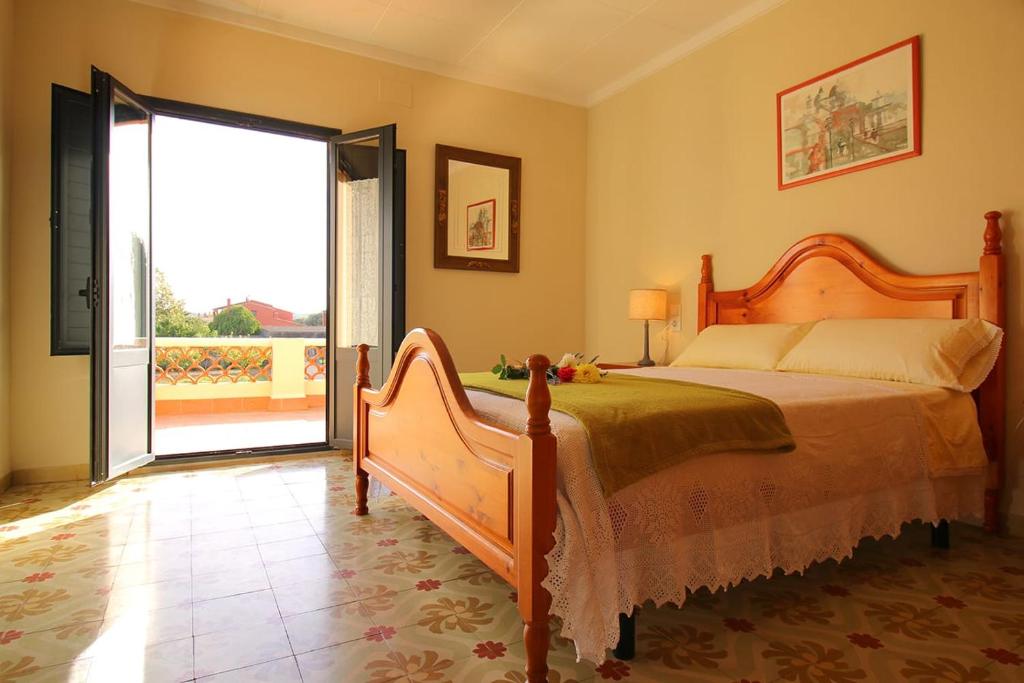 Postel nebo postele na pokoji v ubytování Casa TAPIOLAS