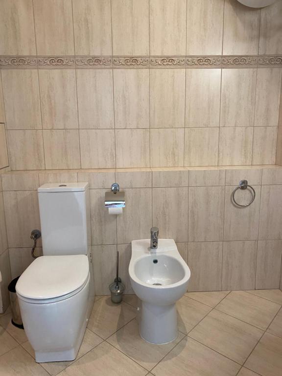 A bathroom at Private Super apartments by sea in Apart Hotel !