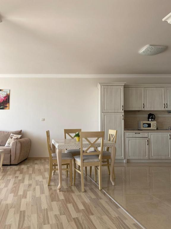 A kitchen or kitchenette at Private Super apartments by sea in Apart Hotel !