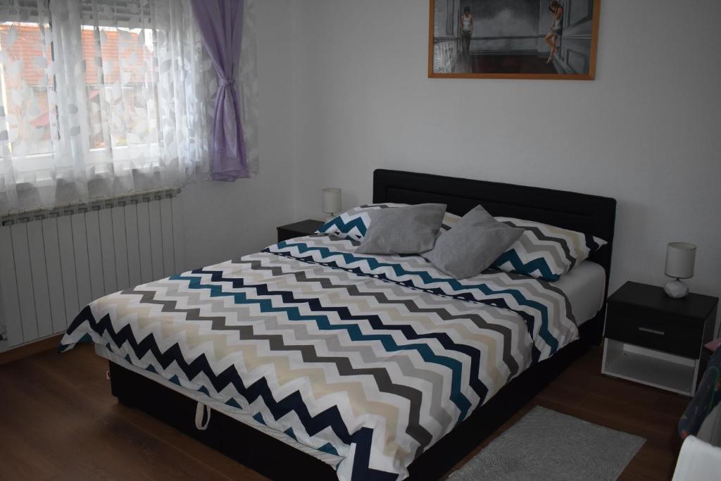 Posteľ alebo postele v izbe v ubytovaní Apartman Rukavina