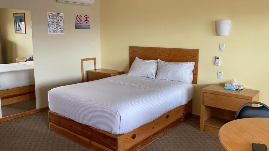 La Huerta Inn & Suites - Habitación De La Reina