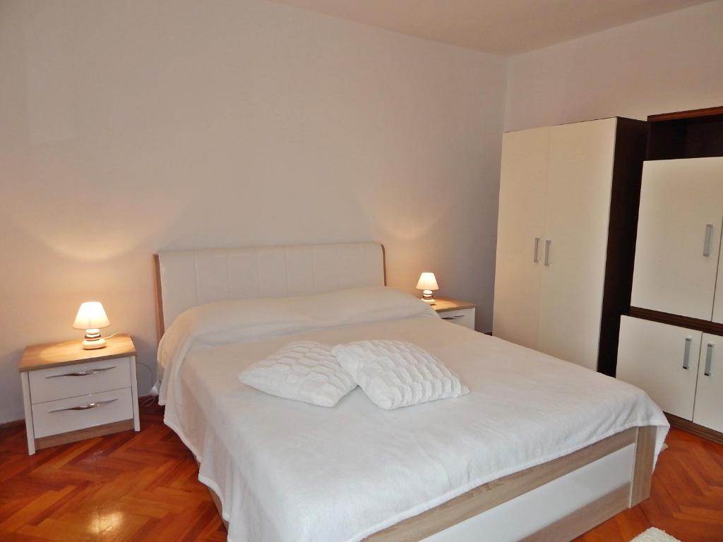 Posteľ alebo postele v izbe v ubytovaní Apartment Baul