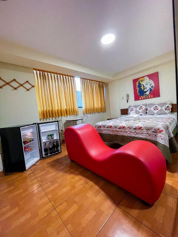 Postel nebo postele na pokoji v ubytování Hostal El Click
