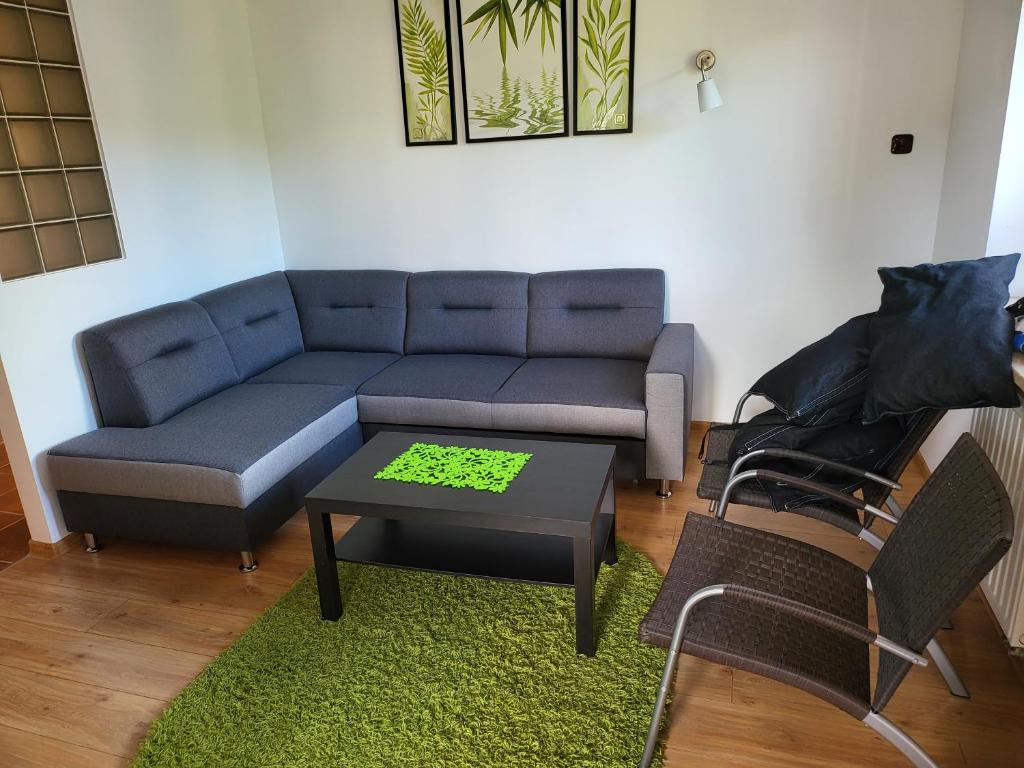 A seating area at Apartament Krynica Eland