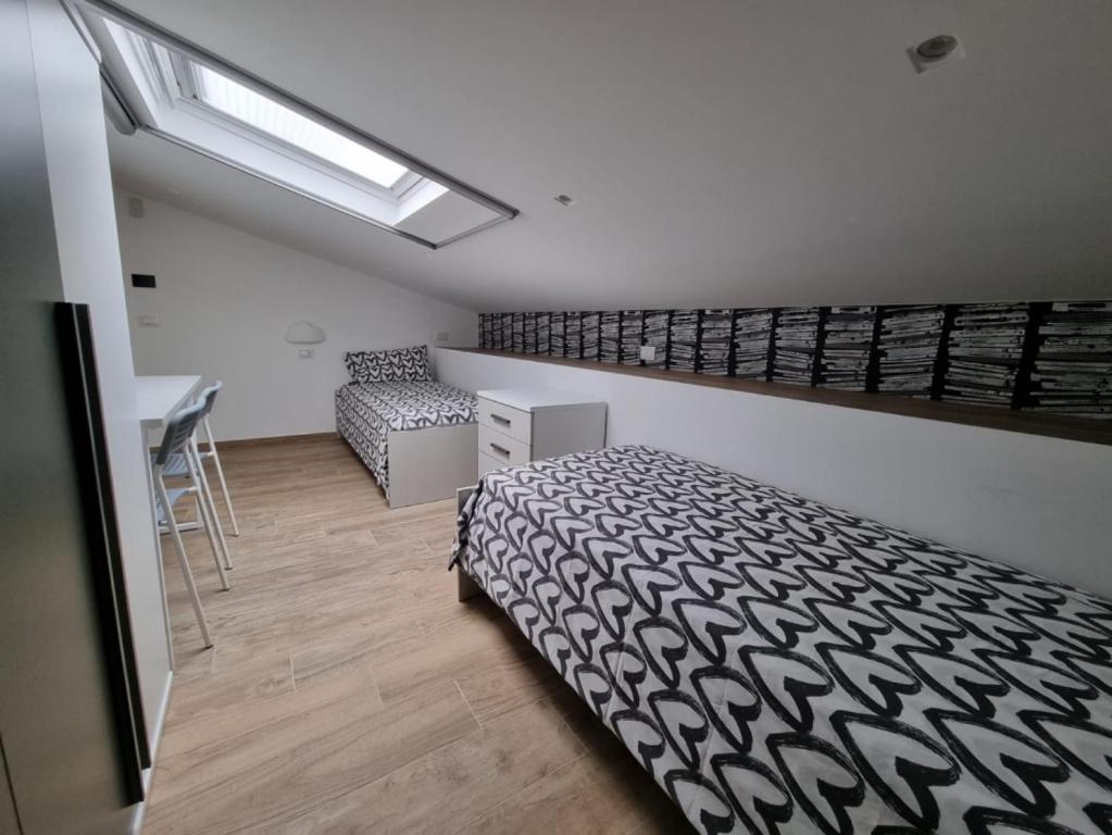 Postel nebo postele na pokoji v ubytování ESA Lodges