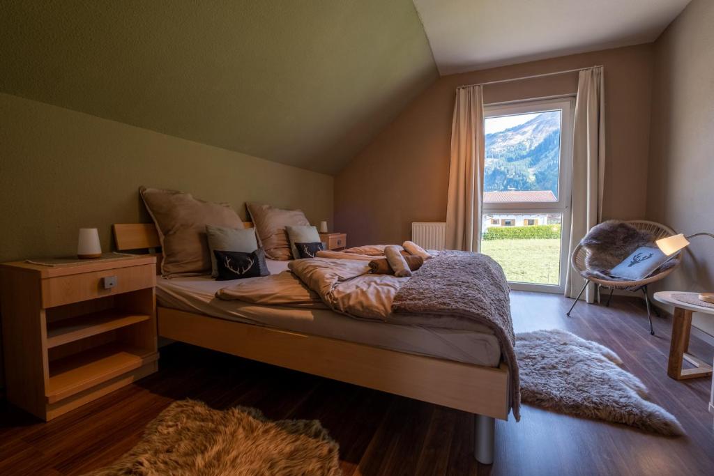 Postel nebo postele na pokoji v ubytování Alprocks Alvaresort