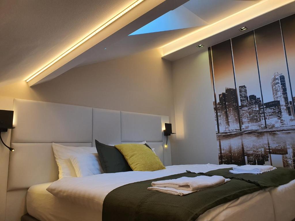 Posteľ alebo postele v izbe v ubytovaní Kaposvár Apartman
